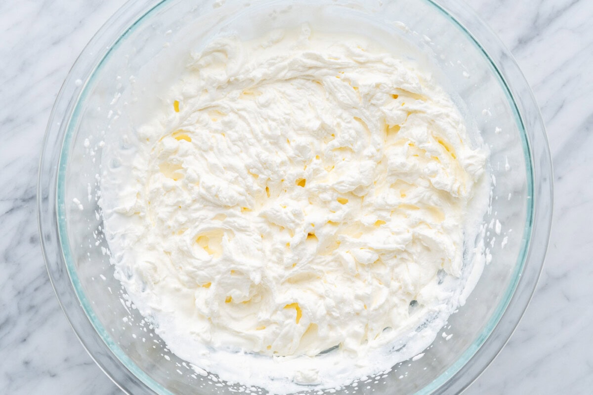 heavy cream whipped in a bowl