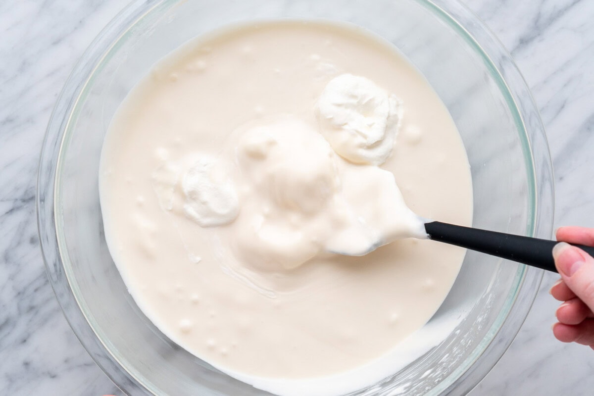 whipped cream folded into no churn ice cream base