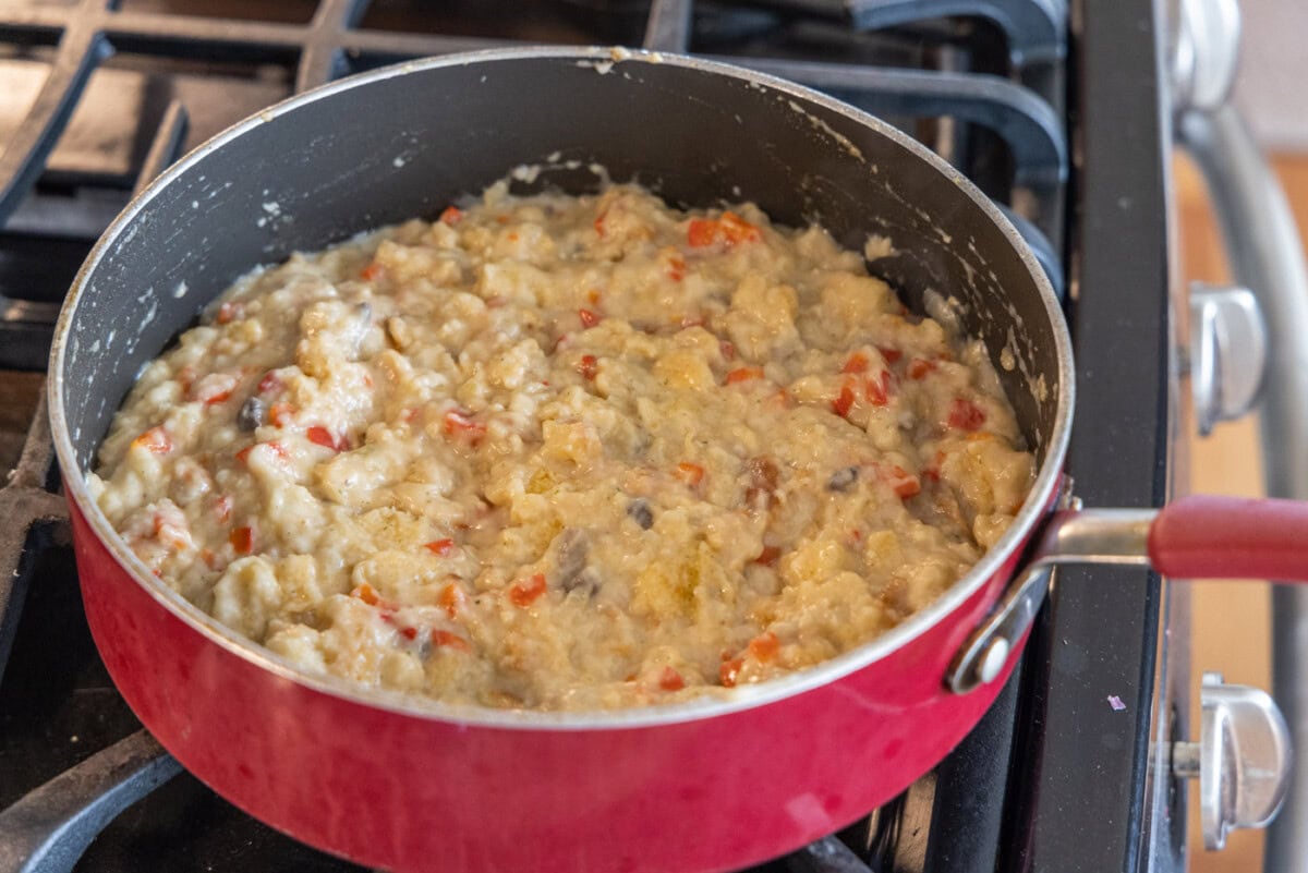 stuffed chicken breast filling in a skillet