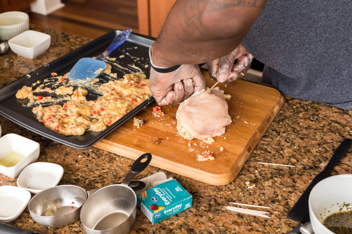 securing stuffed chicken breast with a toothpick