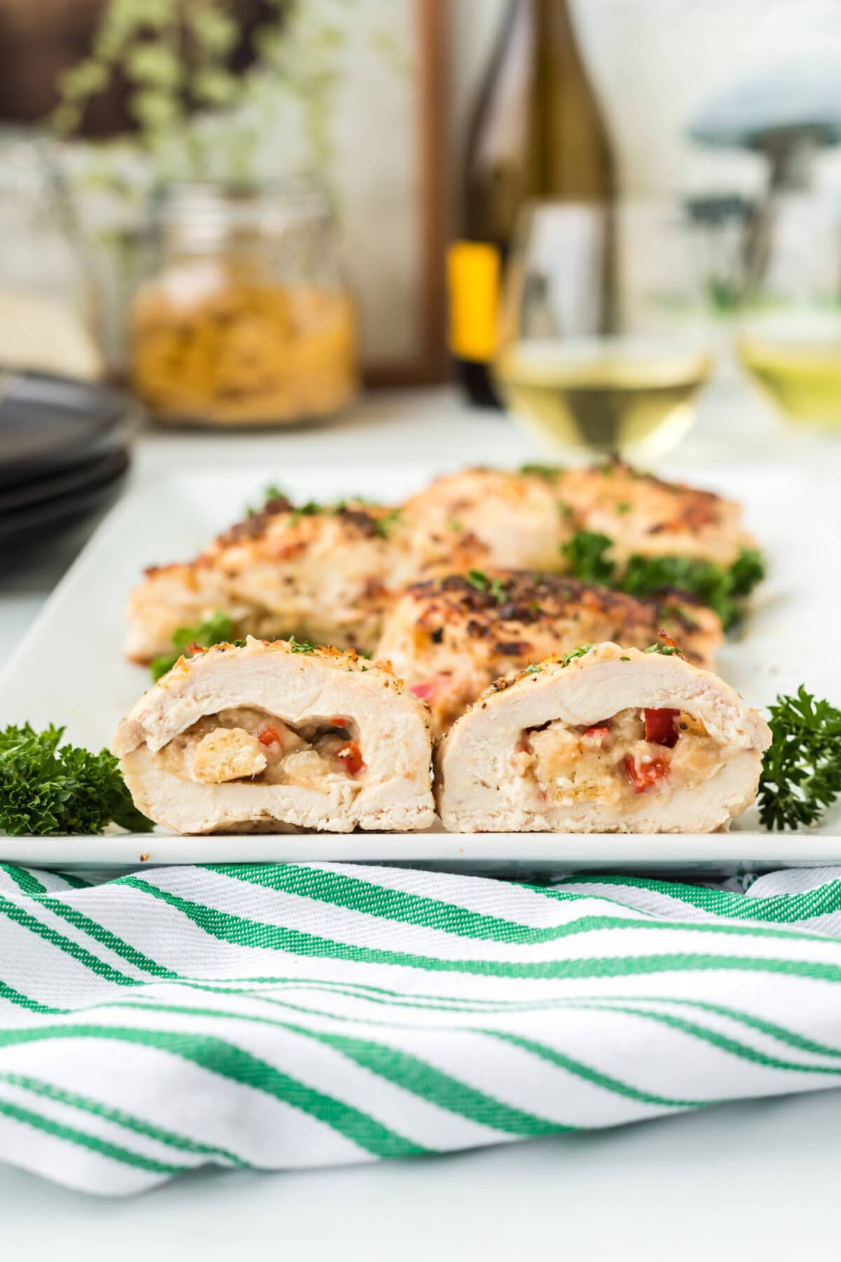 Stuffed Chicken Breast sliced in half on platter
