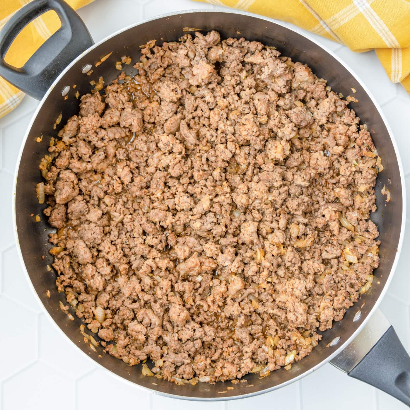 ground beef and italian sausage browned in a skillet