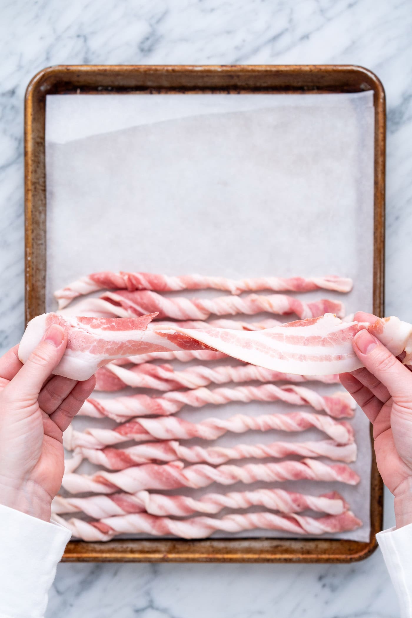 Twisting thick cut bacon