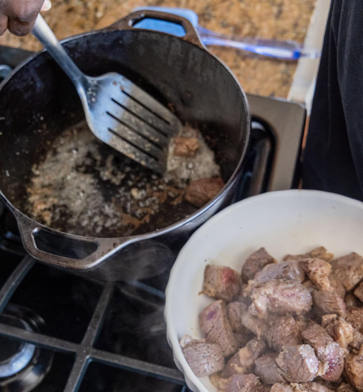removing browned beef from dutch oven