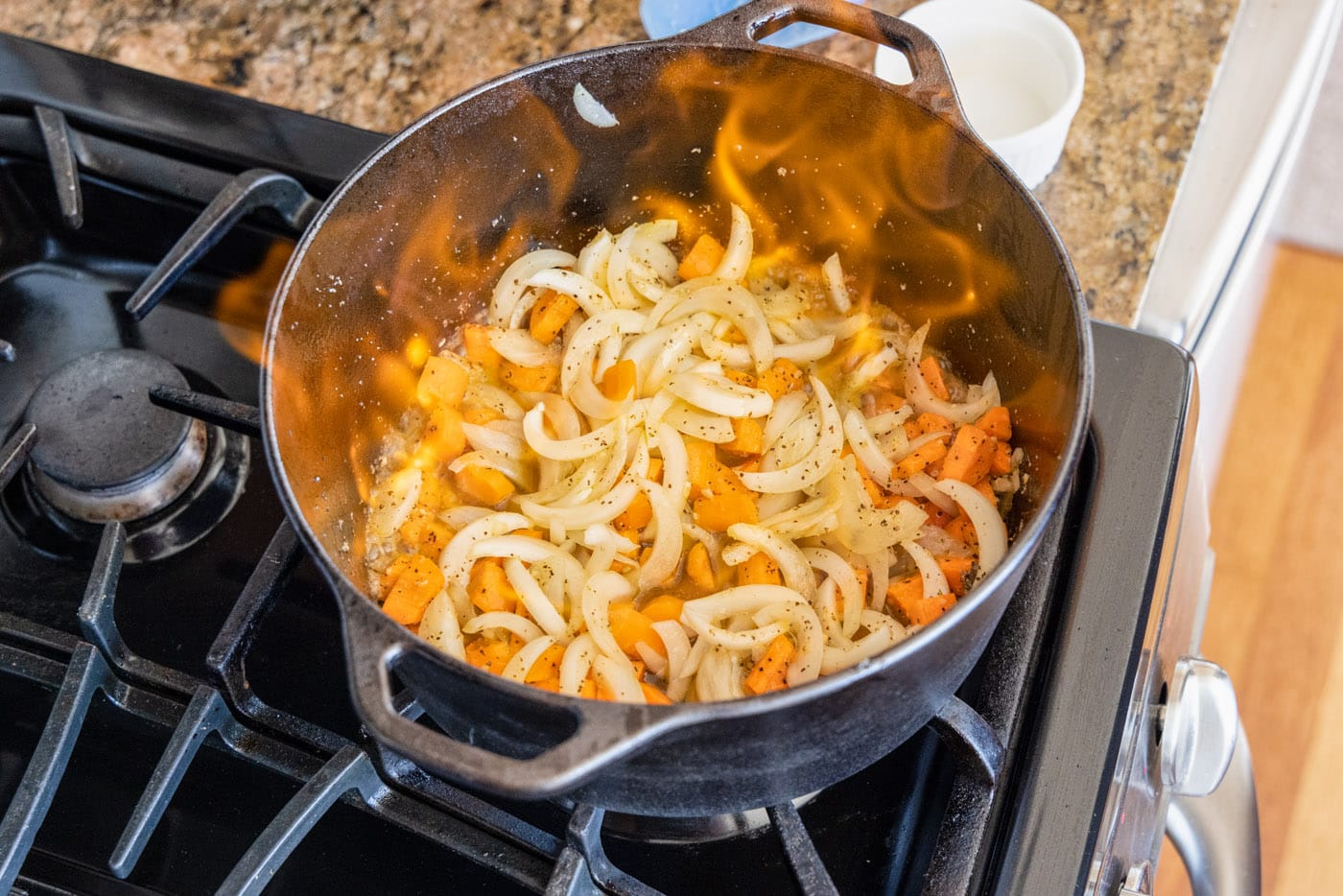 cognac fire over onions and carrots