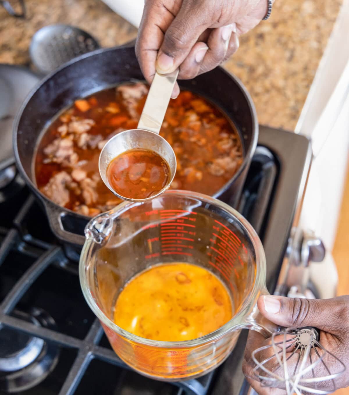 removing juices from stew to a measuring cup