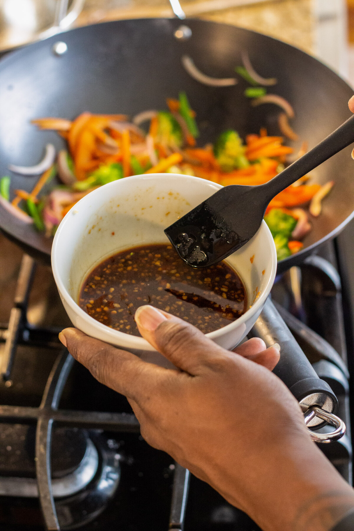 beef lo mein sauce over stir fried veggies
