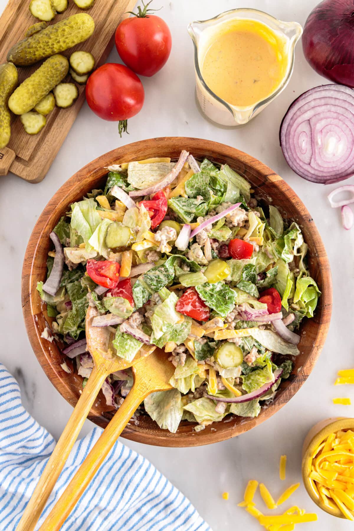 Big Mac Salad with serving spoons