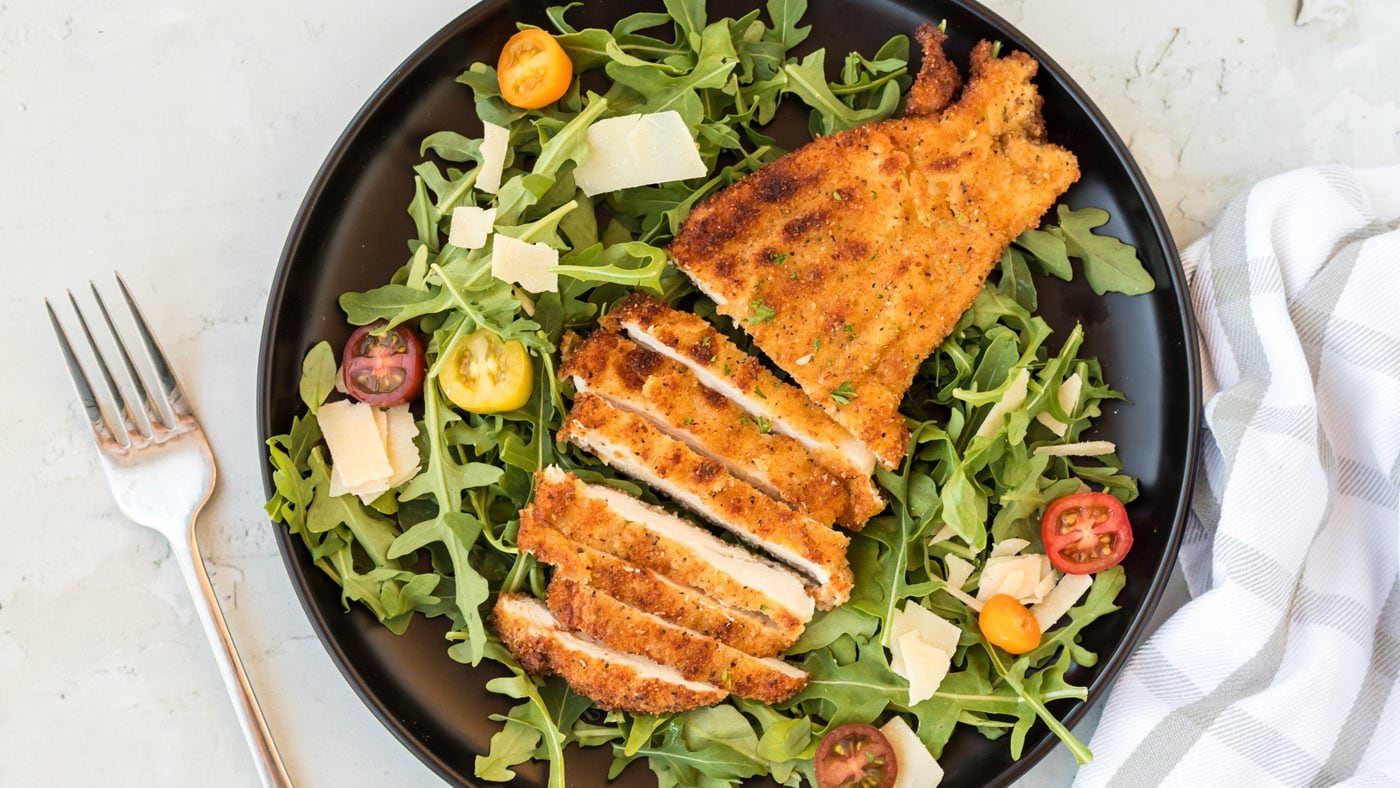 Chicken Milanese is golden and crispy with a delicate crumb and tender white meat interior. It's a g