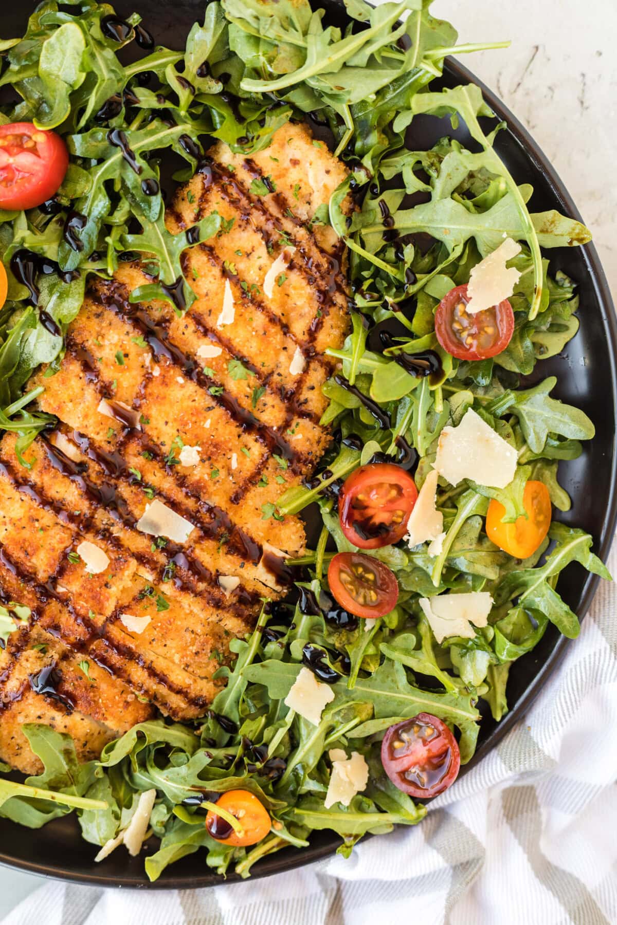 Chicken Milanese with salad greens