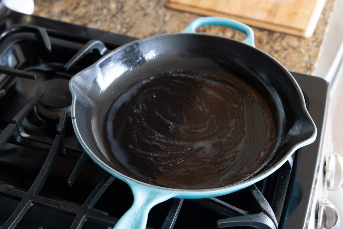 buttered skillet on stovetop