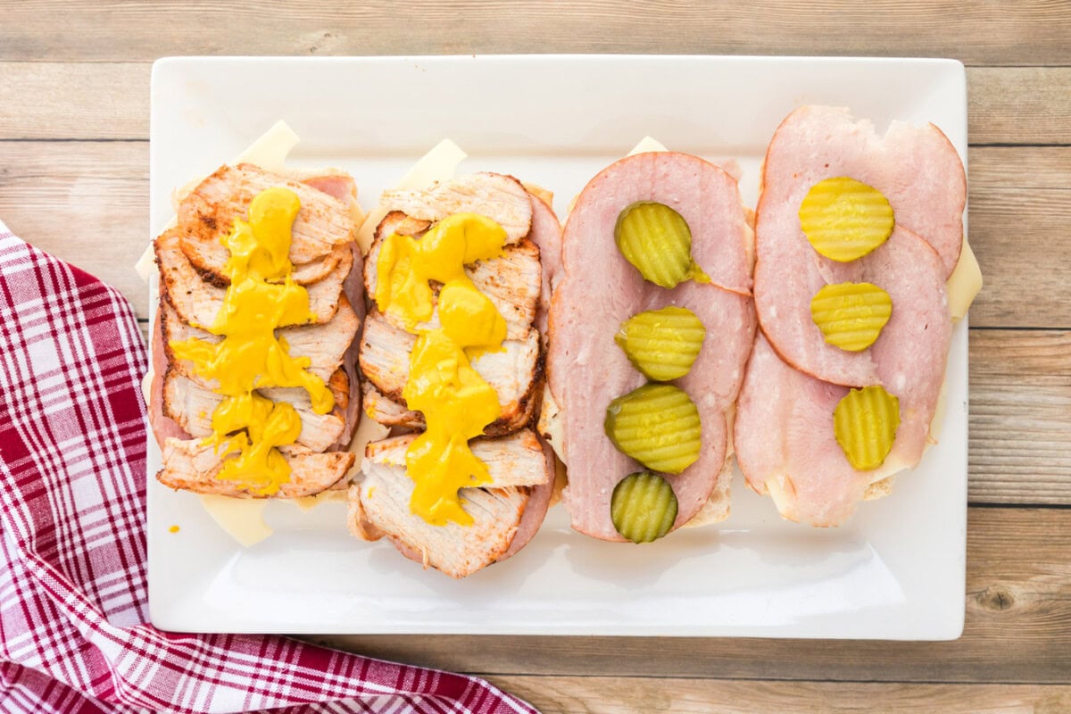 Cuban sandwich assembly with mustard