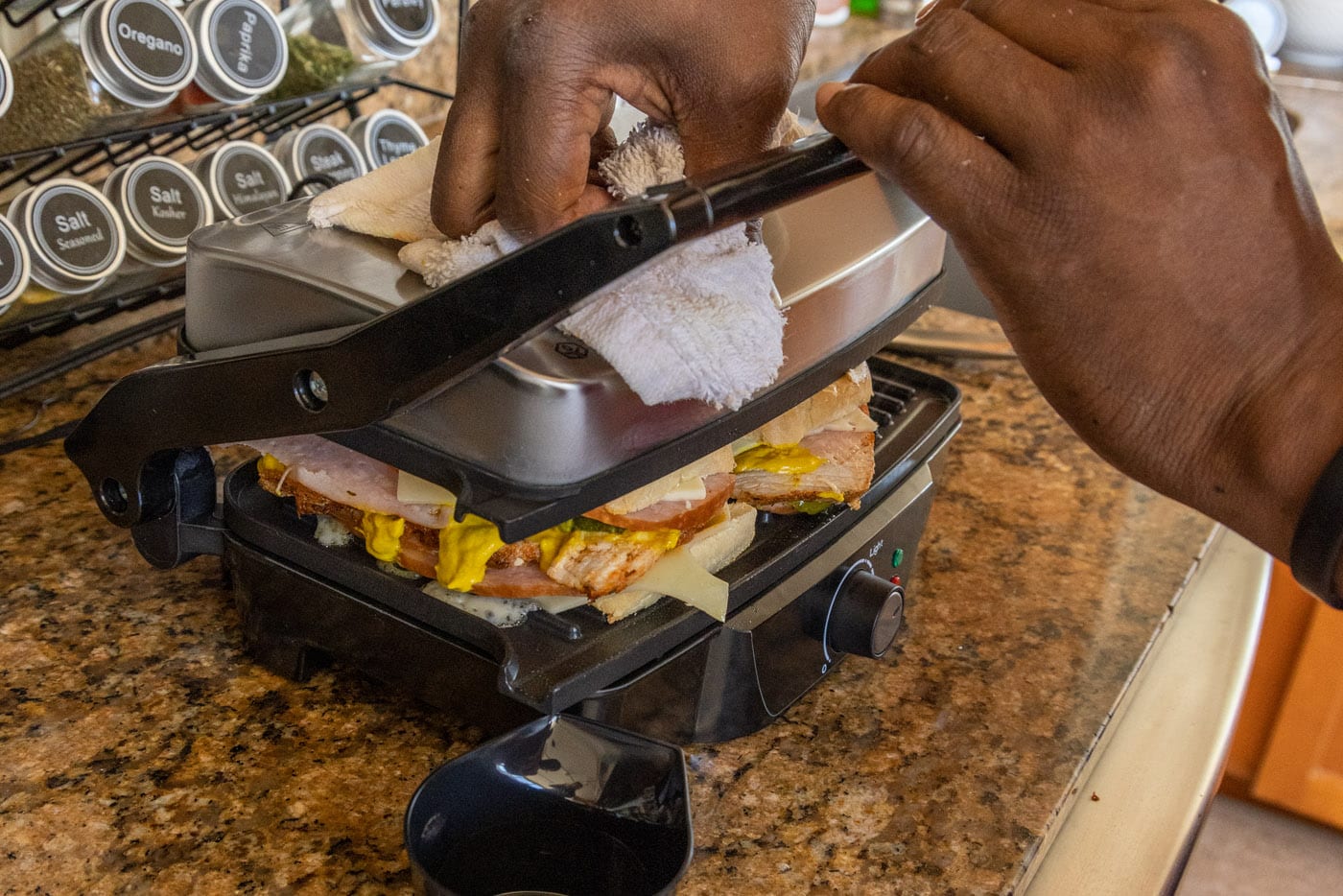 pressing cuban sandwich in a panini maker