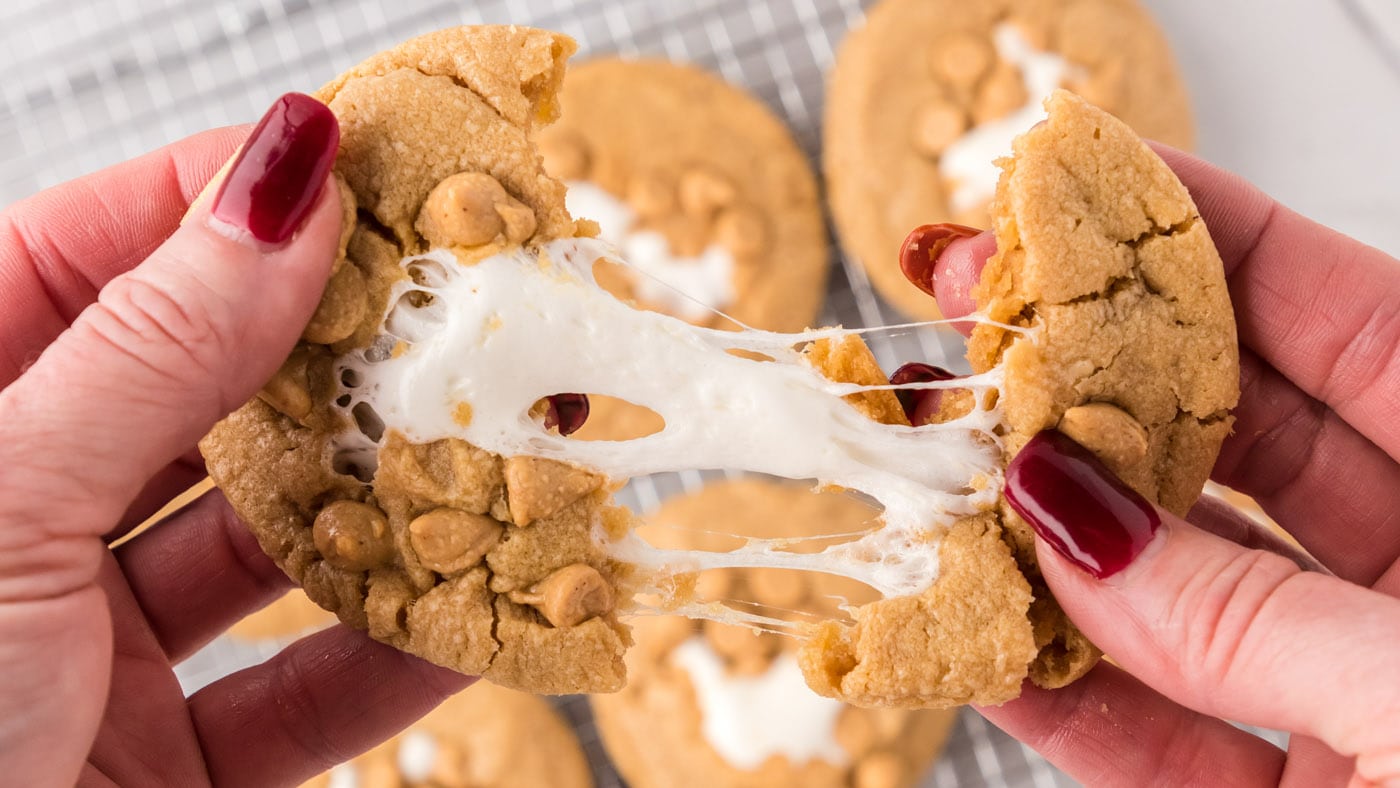 Soft and fluffy peanut butter cookies meet their match with a filling of sticky sweet marshmallows a