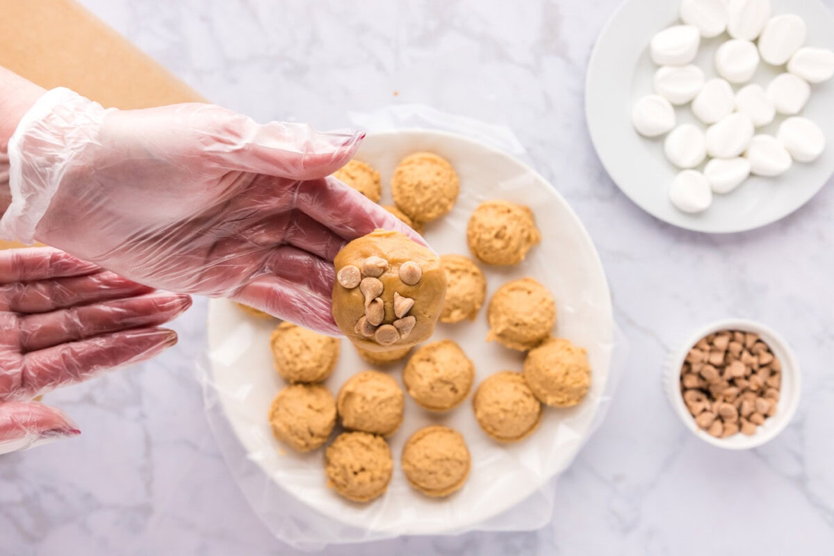 fluffernutter cookie dough ball in hand