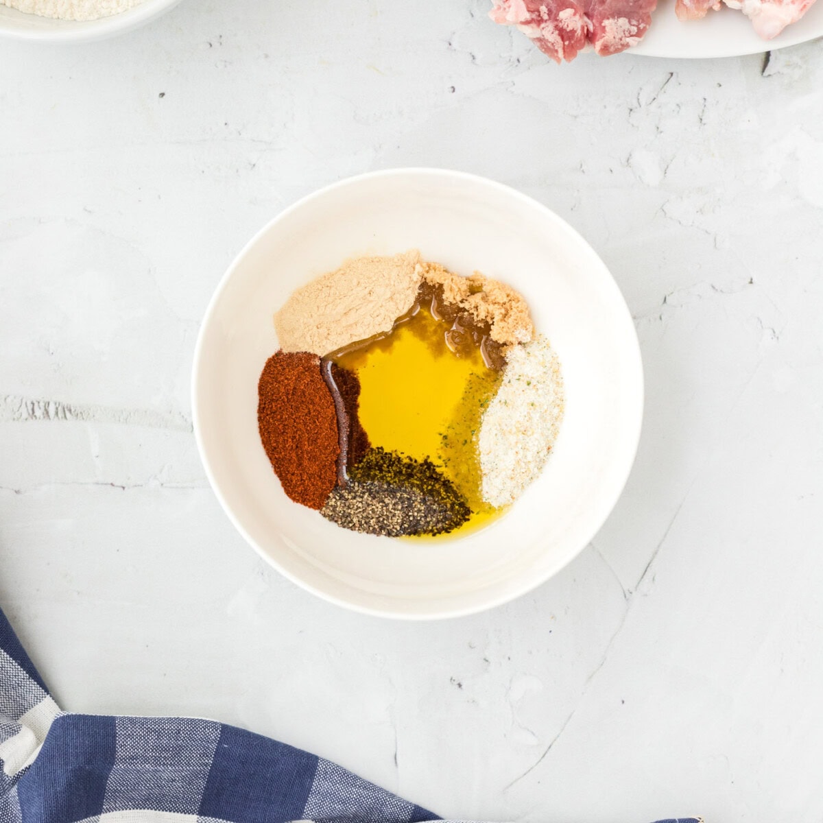 olive oil with seasoning in a bowl