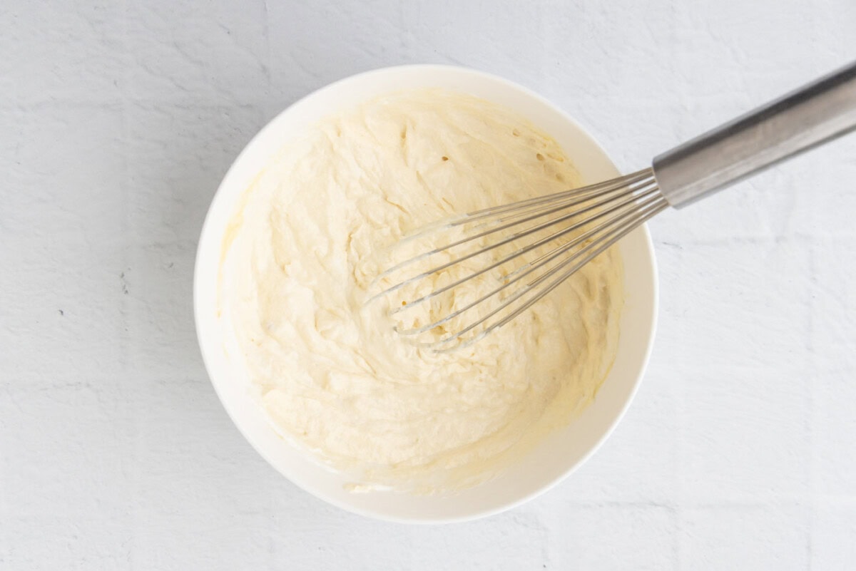 whisked cream of chicken soup and sour cream in a bowl