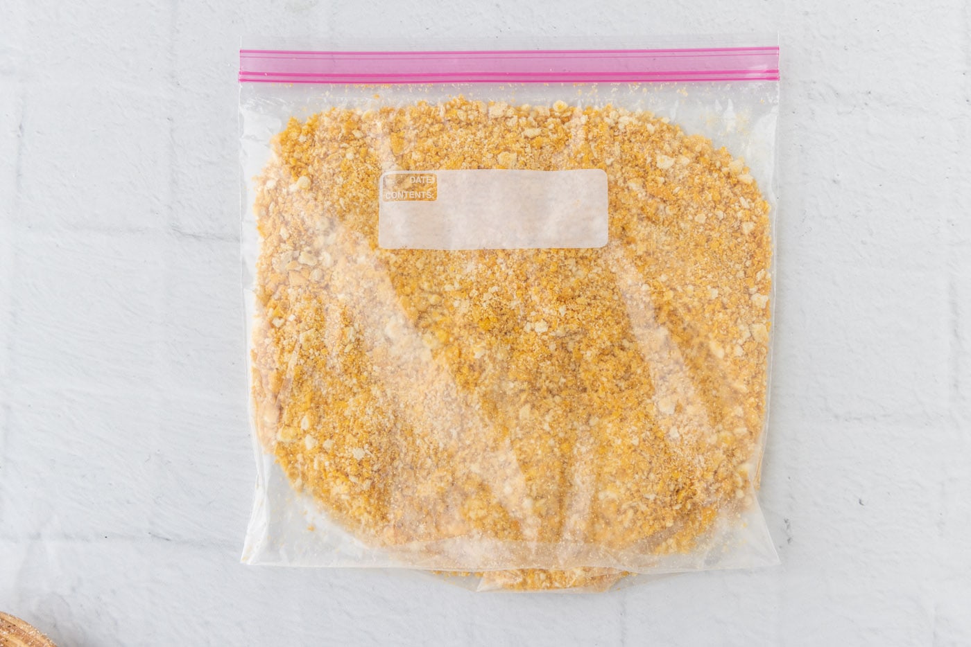 ritz crackers and cornflake crushed in a ziplock bag