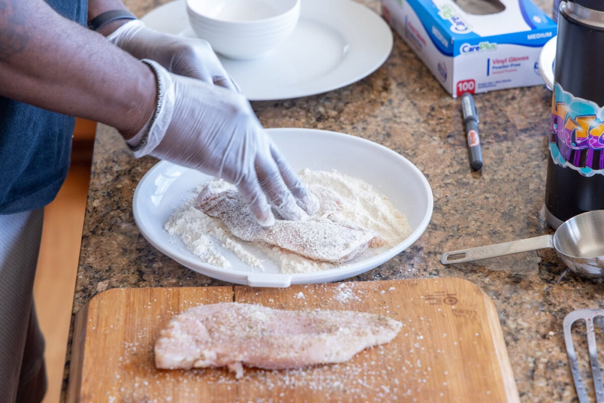chicken breast covered in flour
