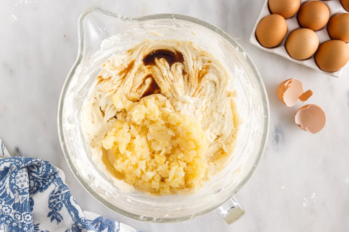 pineapple pound cake ingredients in a mixing bowl