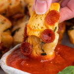 dipping a pizza bite
