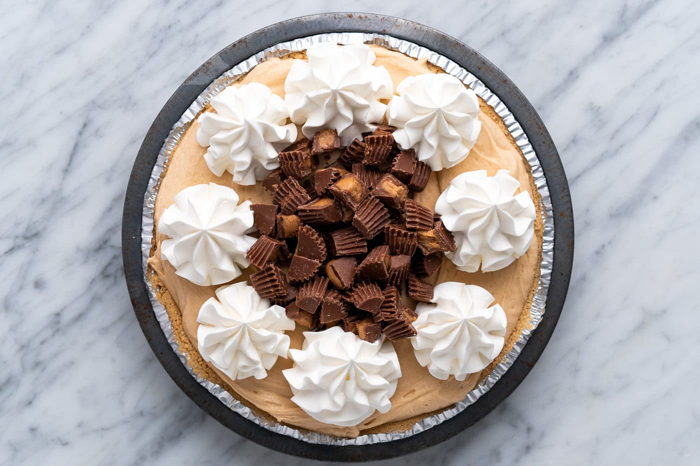 chopped peanut butter cups in the center of Reese's pie