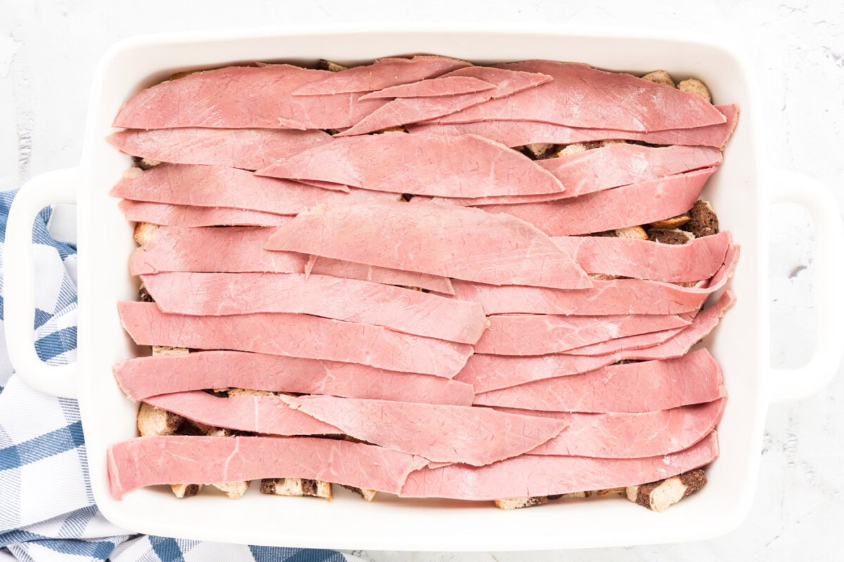 corned beef strips layered over bread cubes