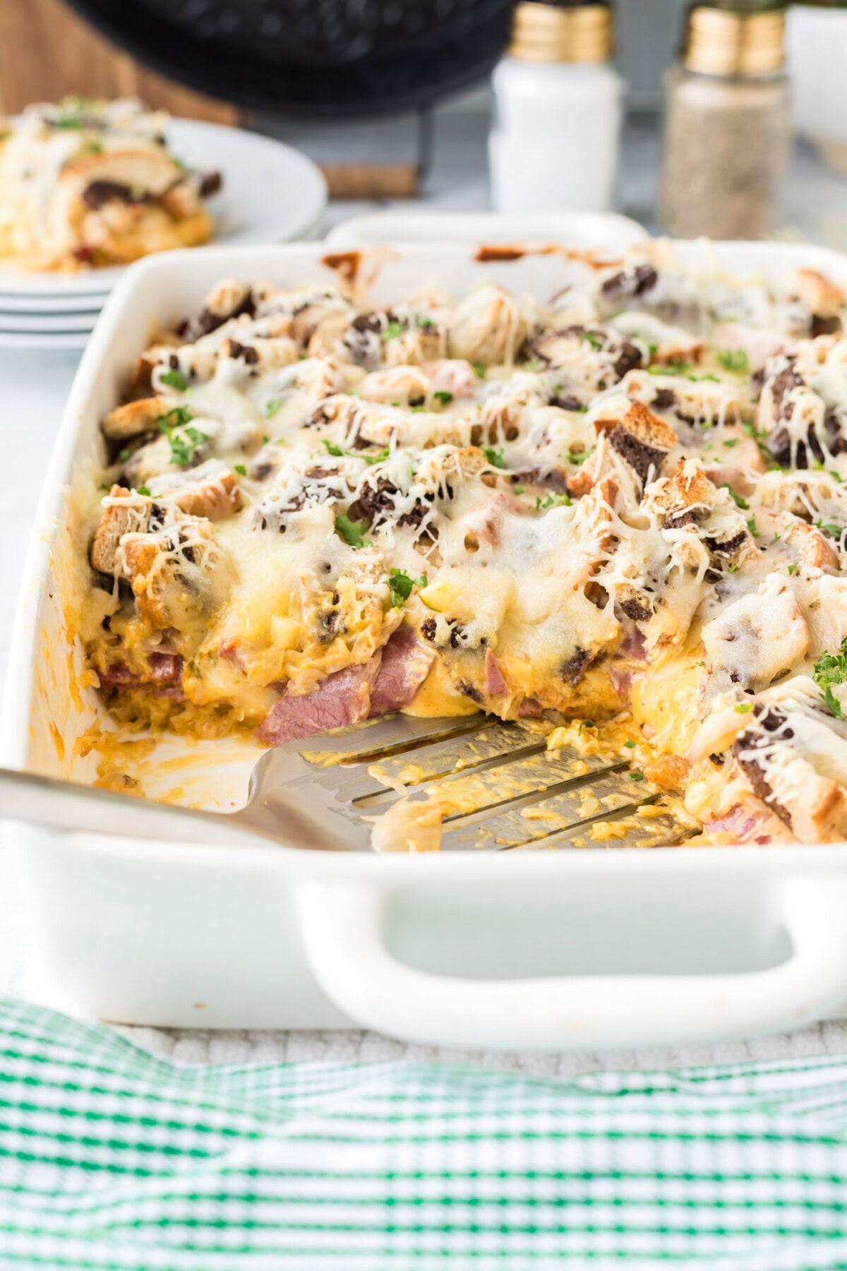 spatula in a pan of Rueben Casserole