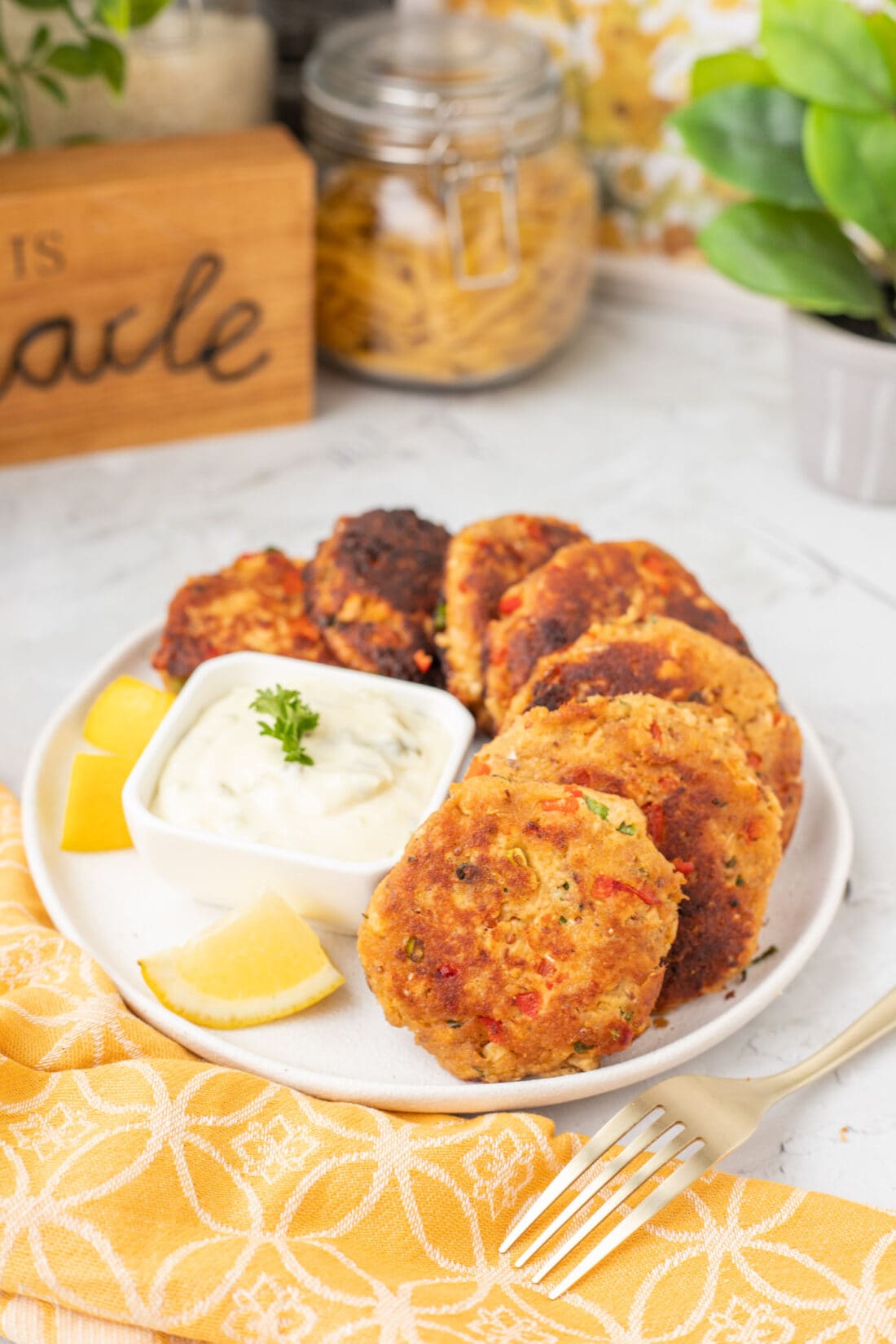 Salmon Croquettes on a plate with sauce