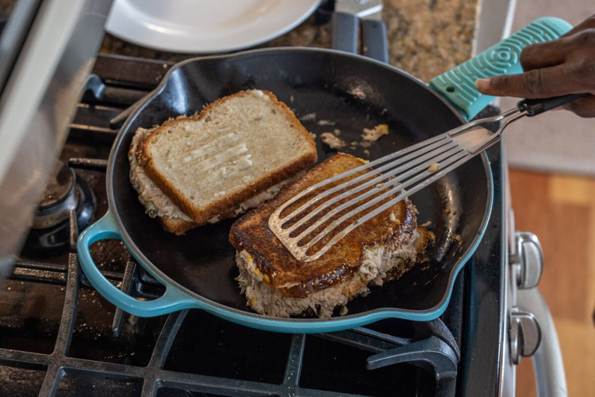 flipping tuna melts in a skillet