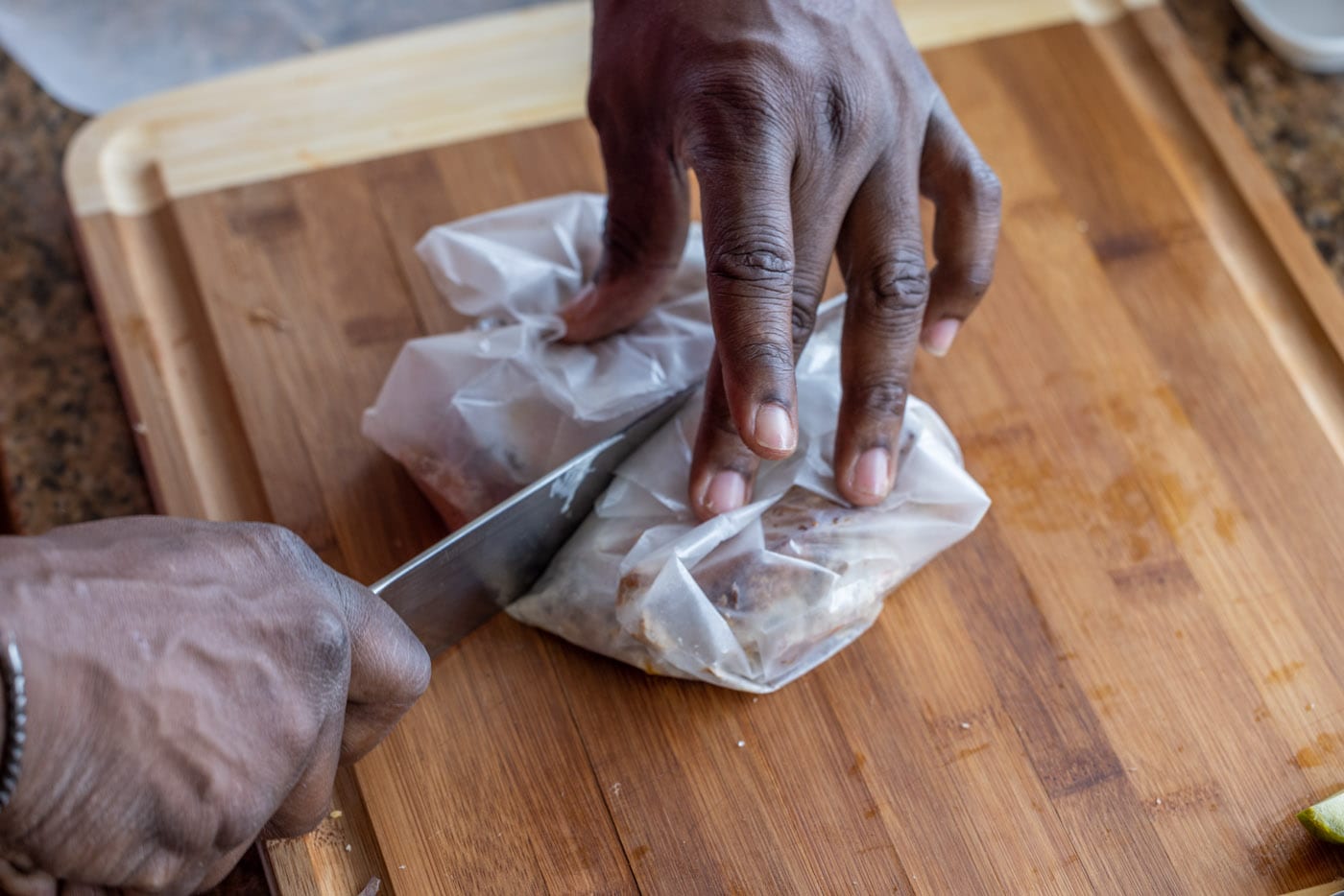 slicing tuna melt in parchment paper