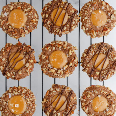 Turtle Thumbprint Cookies on a wire rack