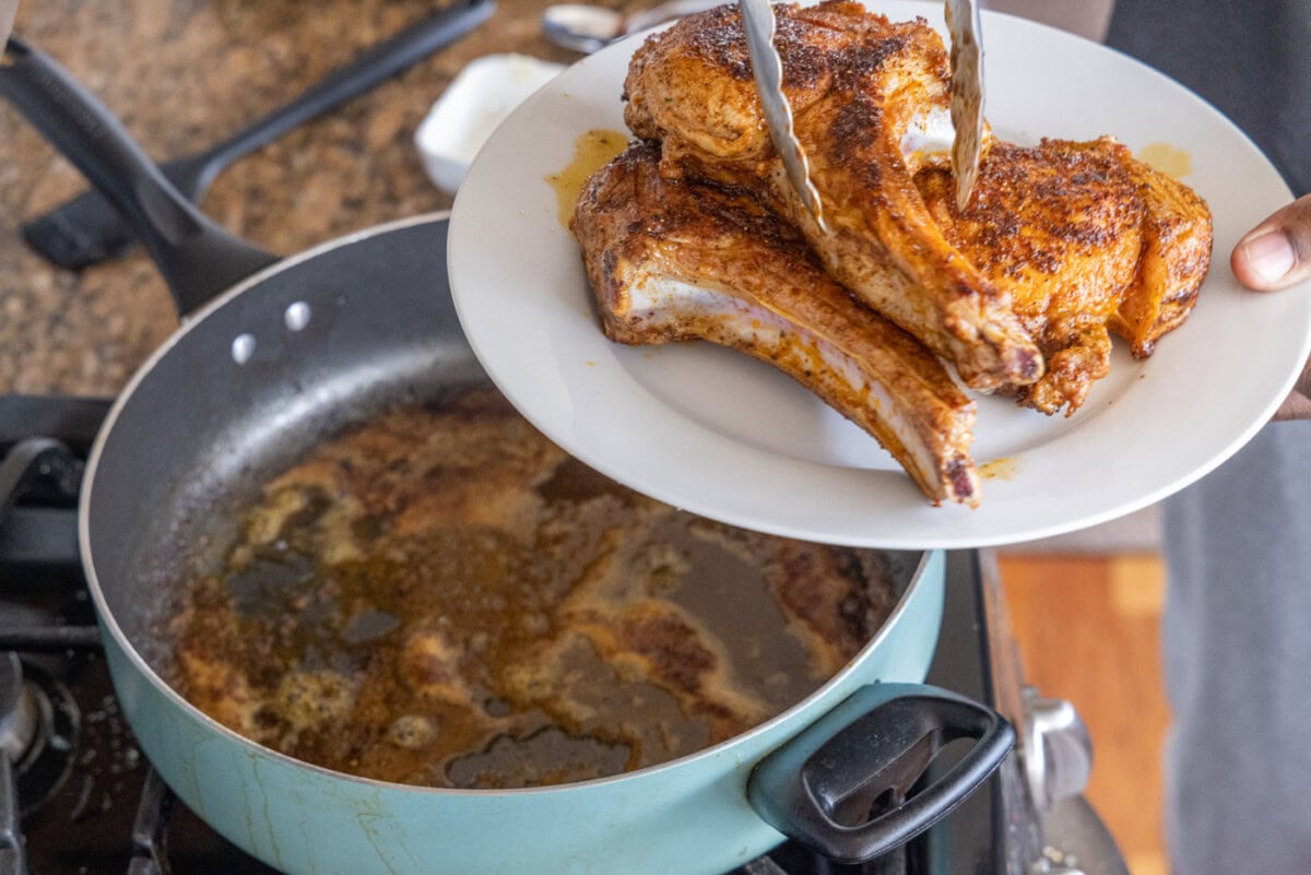 removing veal chops from skillet