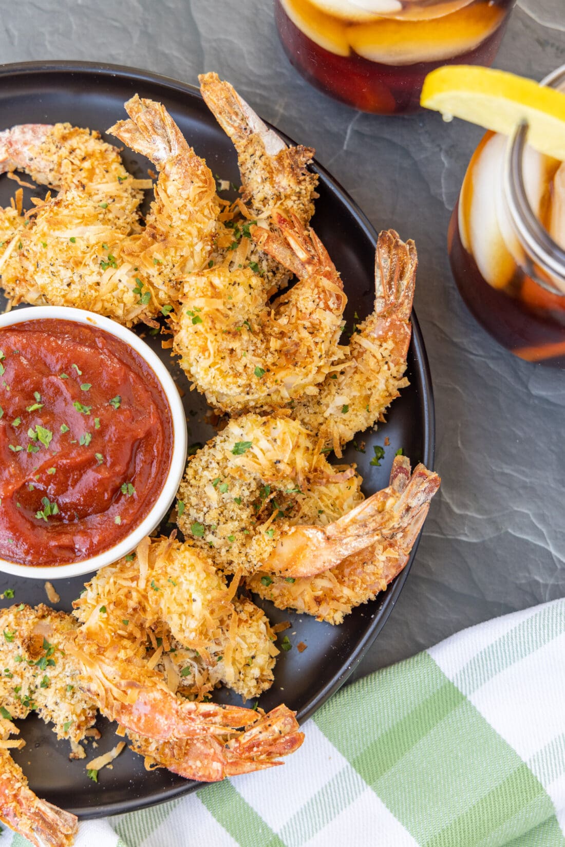 Air Fryer Coconut Shrimp on plate with sauce