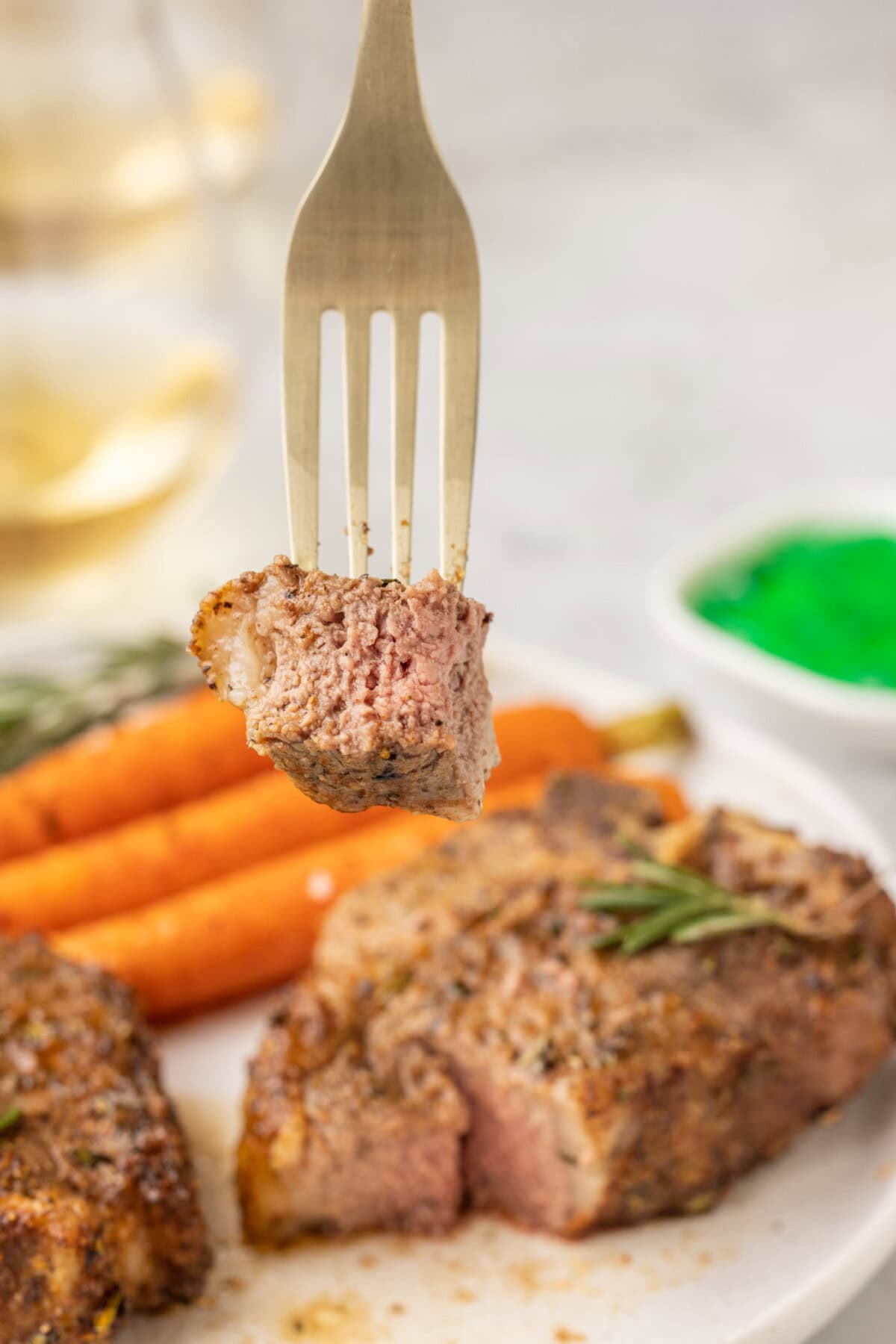 fork with cut lamb chop