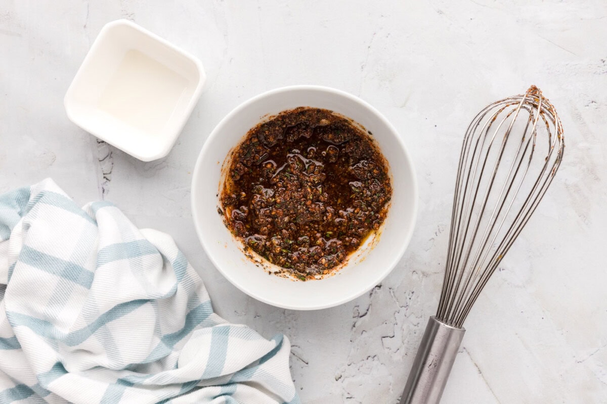 lamb chops wet rub in a bowl