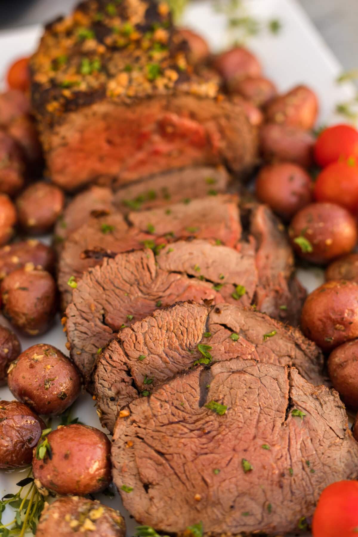 Beef Tenderloin sliced on a platter