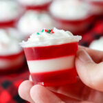 holding a Candy Cane Jello Shot