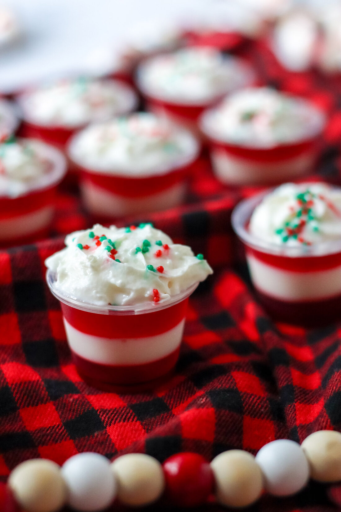 Candy Cane Jello Shots with whipped cream