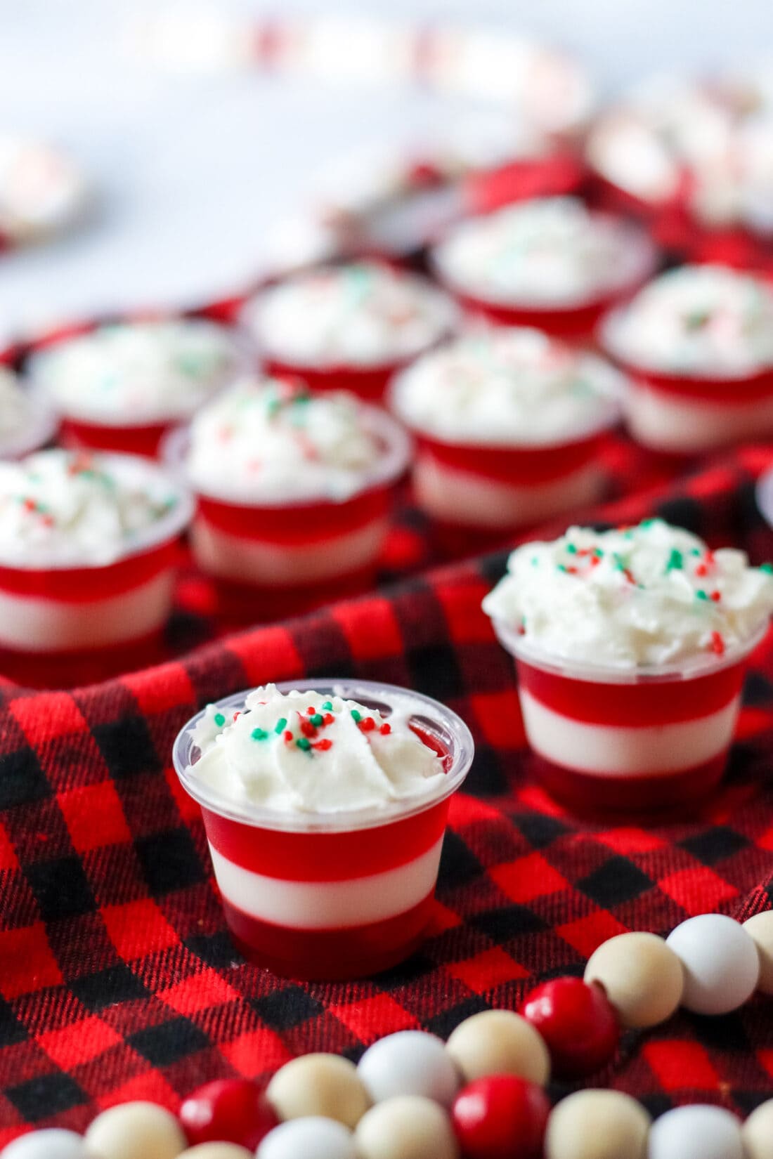 Candy Cane Jello Shots on red and black fabric