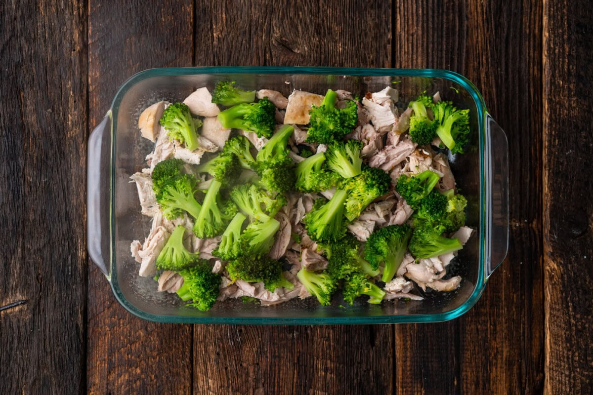 broccoli on top of chicken in casserole dish
