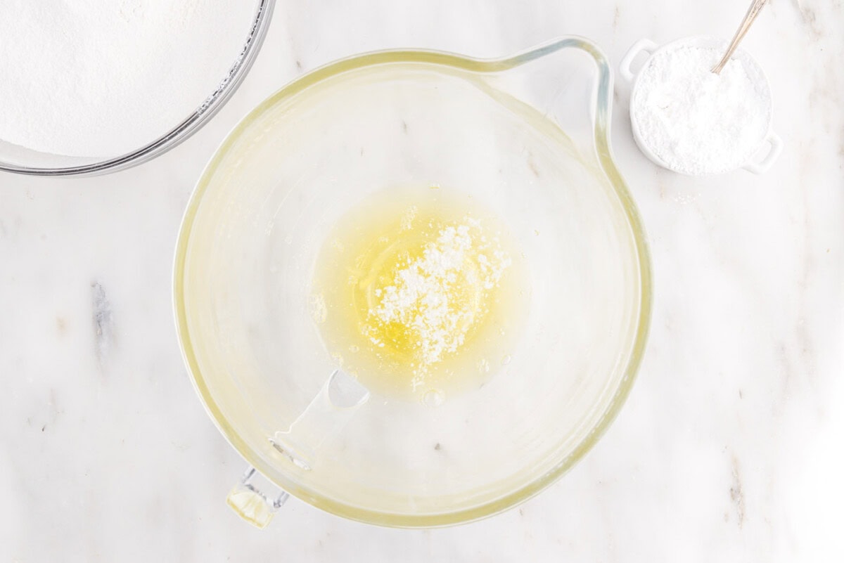 egg whites and cream of tartar in stand mixer bowl
