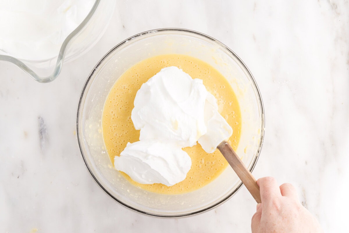 folding egg whites into yolk mixture