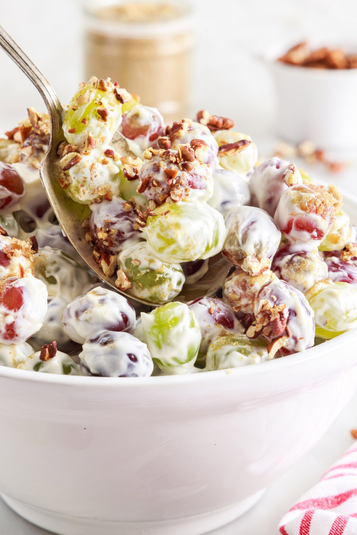 spoon lifting Grape Salad
