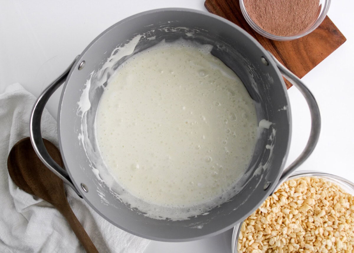 melted marshmallows and butter mixture in a pan
