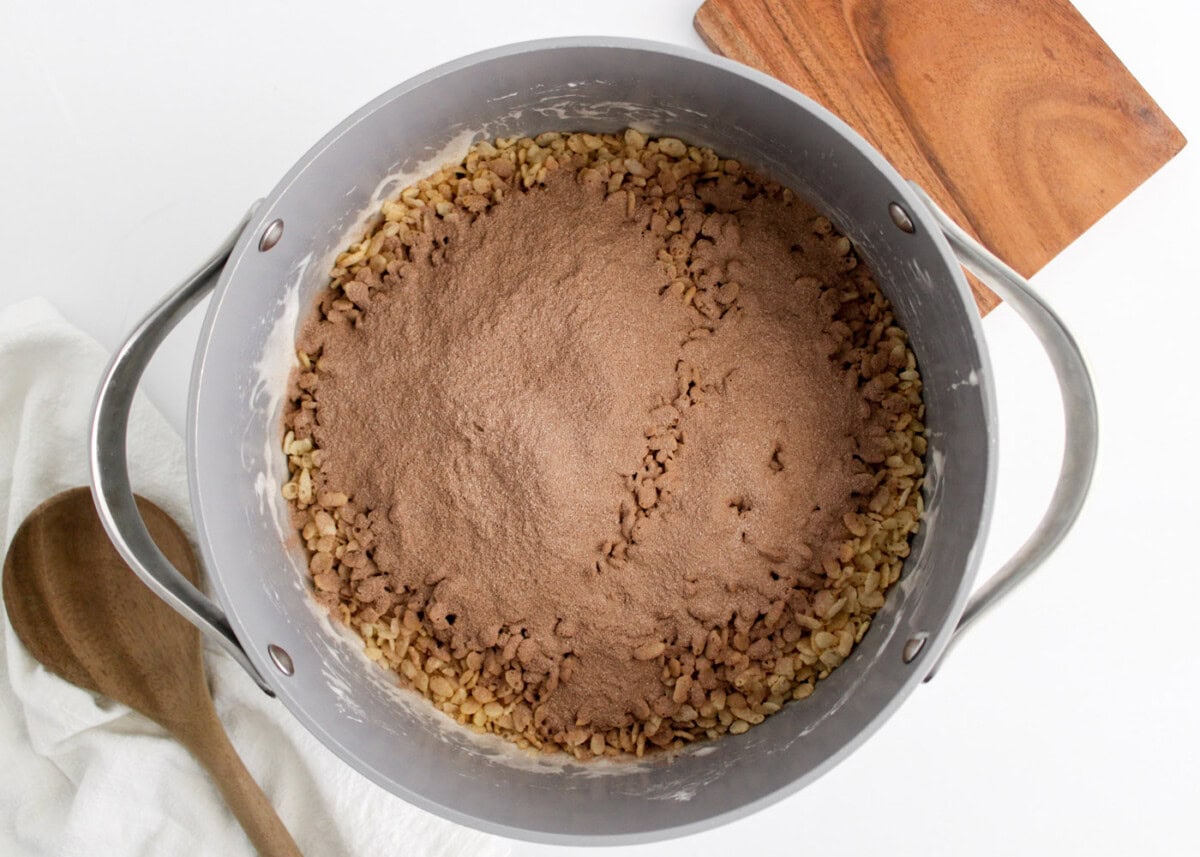 adding hot chocolate mix to rice krispies