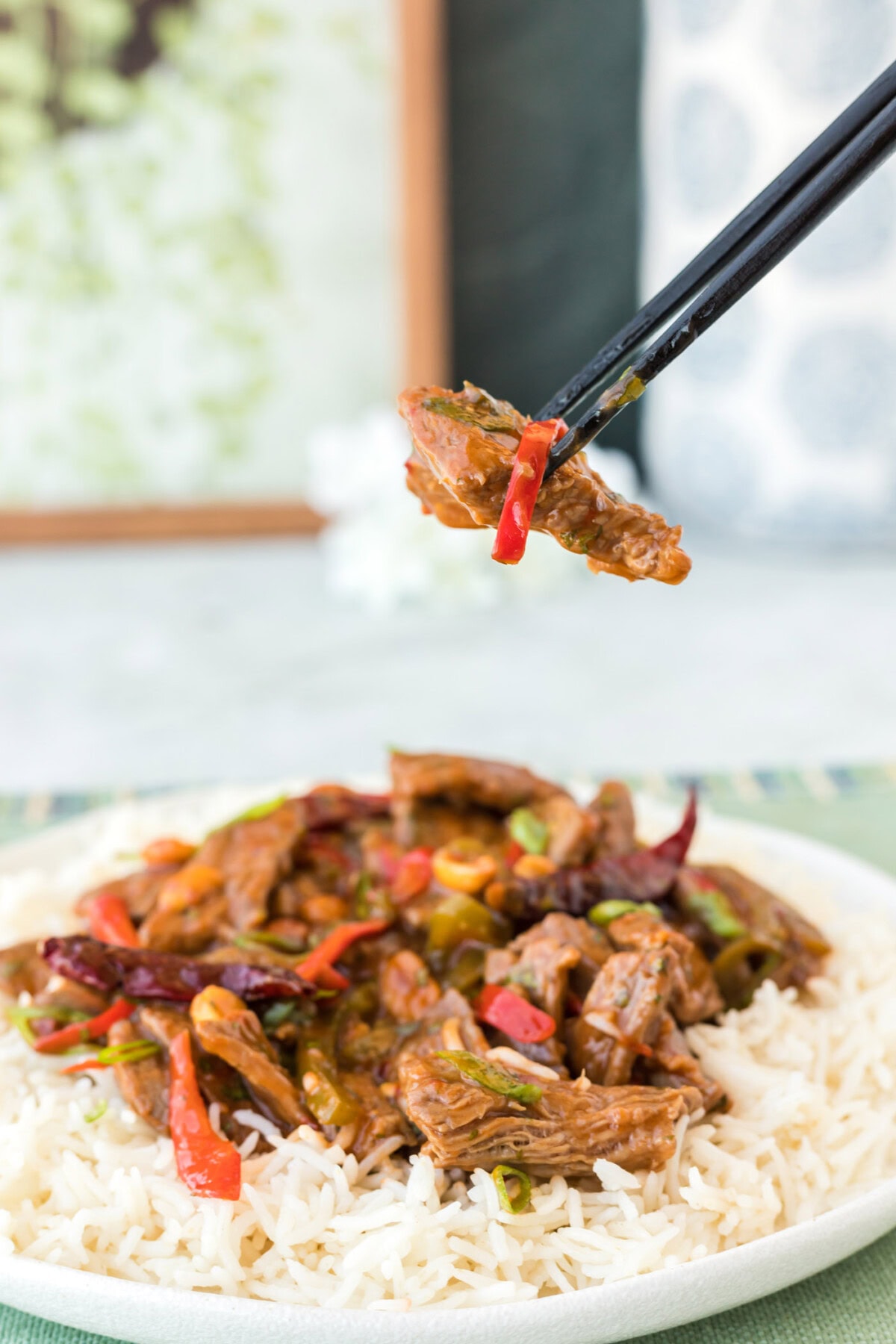 chopsticks lifting Kung Pao Beef