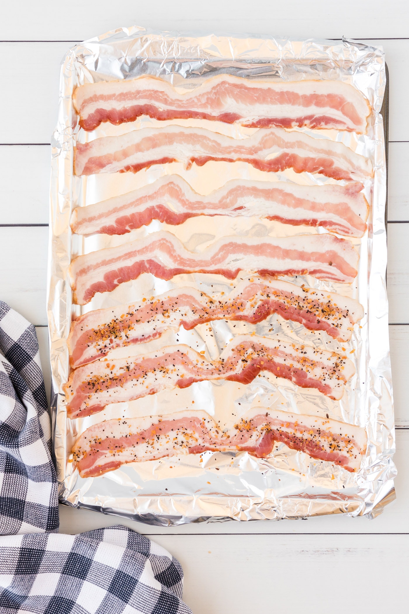 bacon on baking sheet with aluminum foil