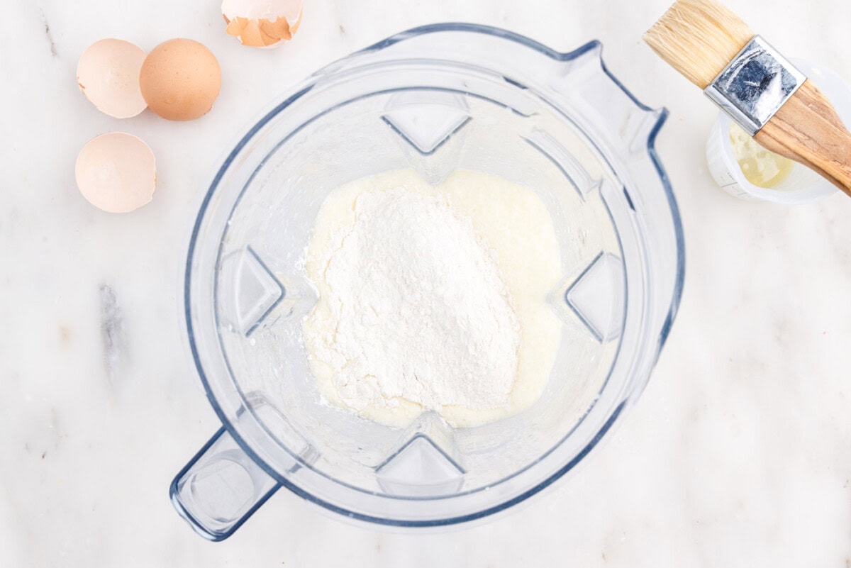 flour added to popover batter in a blender