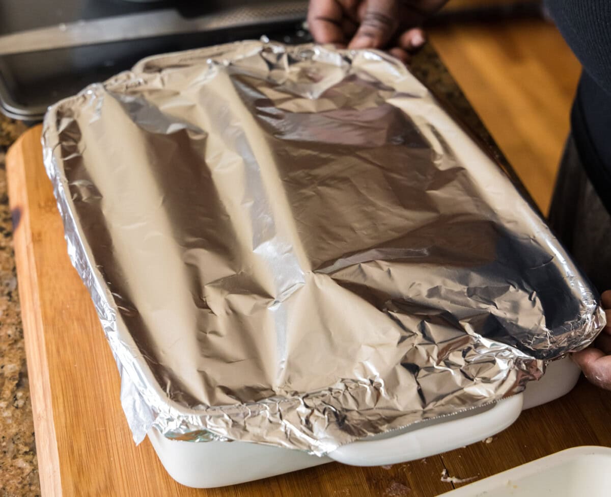seafood lasagna covered with foil